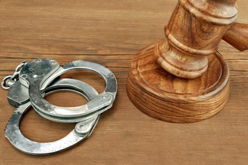 Handcuffs and gavel